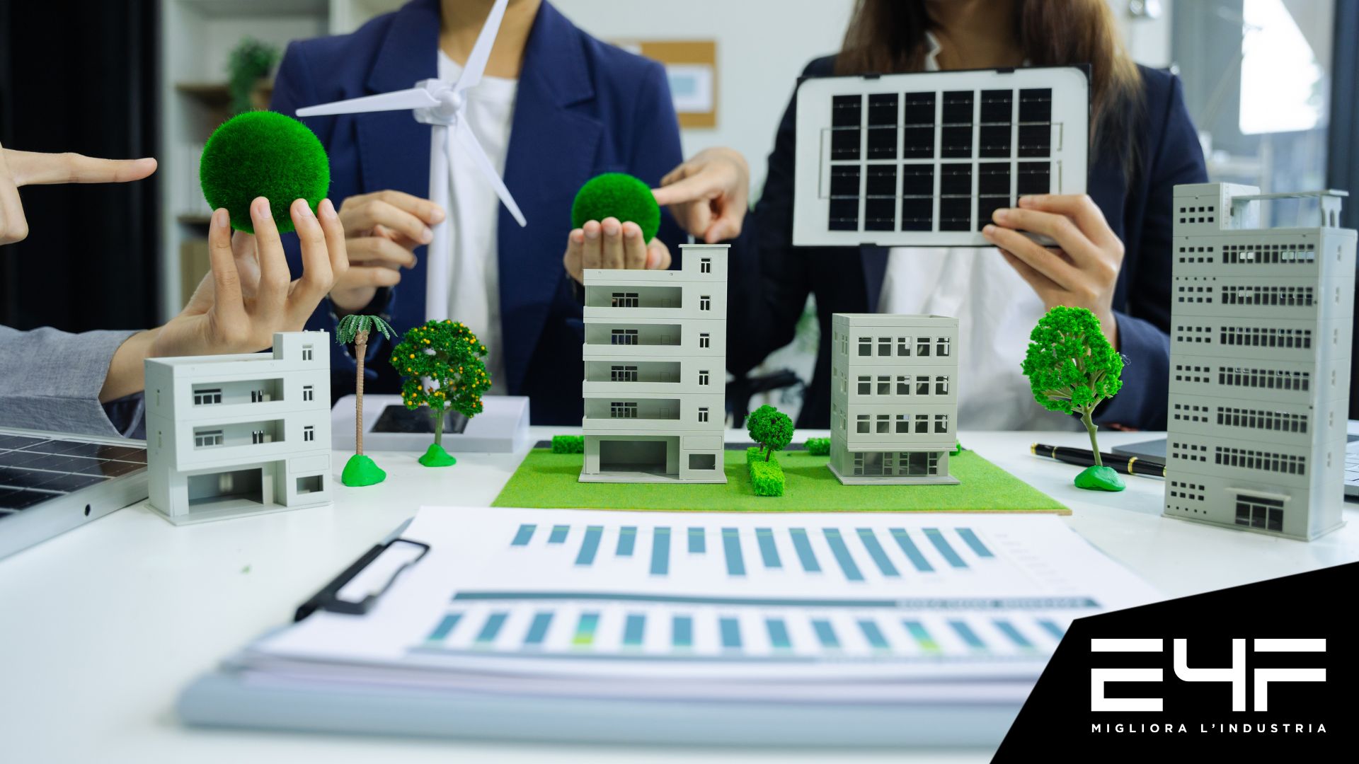 tecnici ingegneri seduti che lavorano sull'efficienza energetica